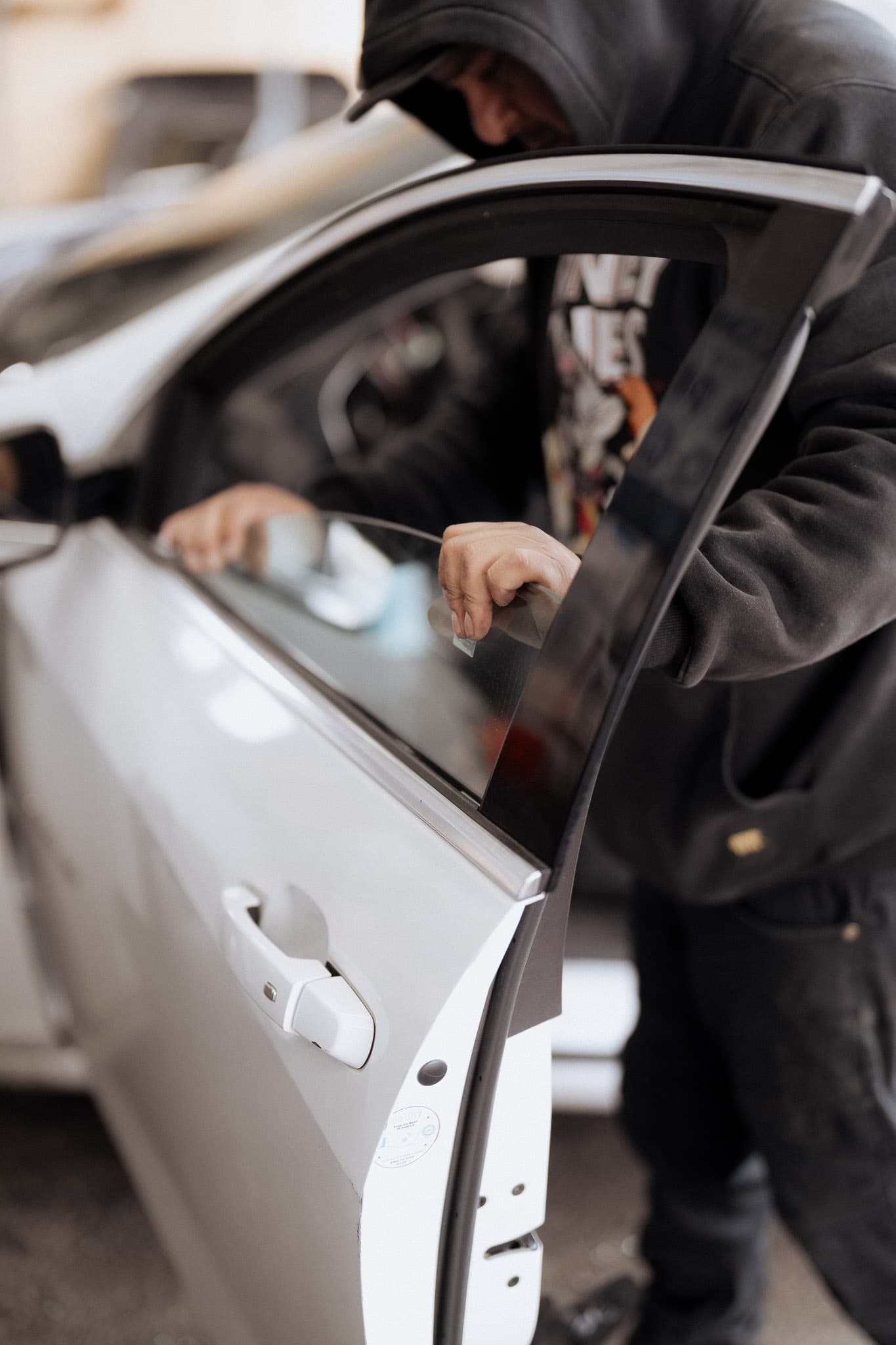Professional windshield replacement in progress